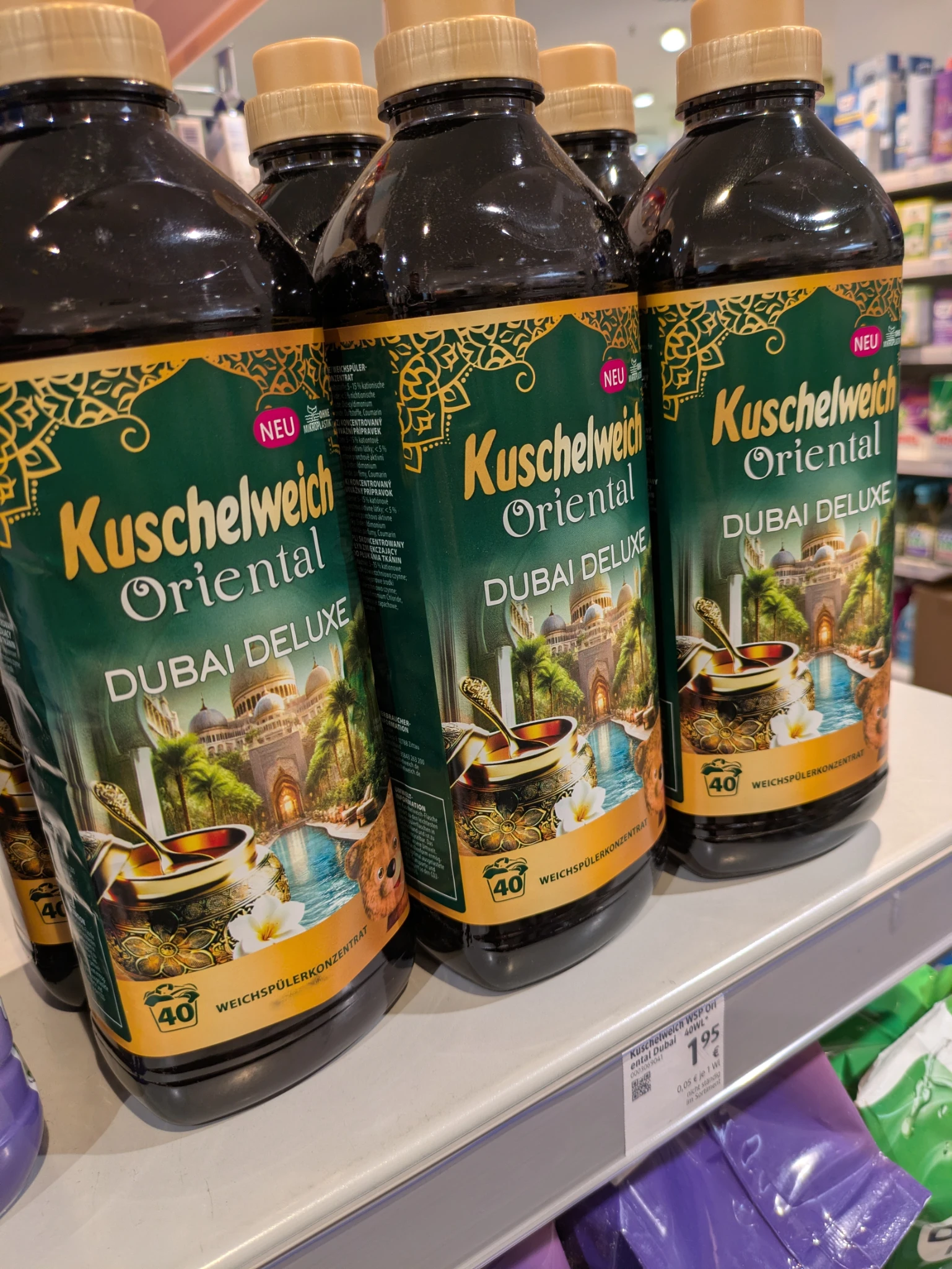 drei flaschen Weichspüler kuschelweich oriental dubai deluxe in gold-grün